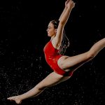 Dancer in red splits
